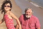 Chris-Bryan-seashore w/ granddaughter